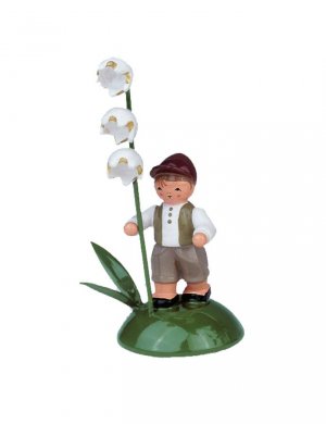 junge mit maiglöckchen