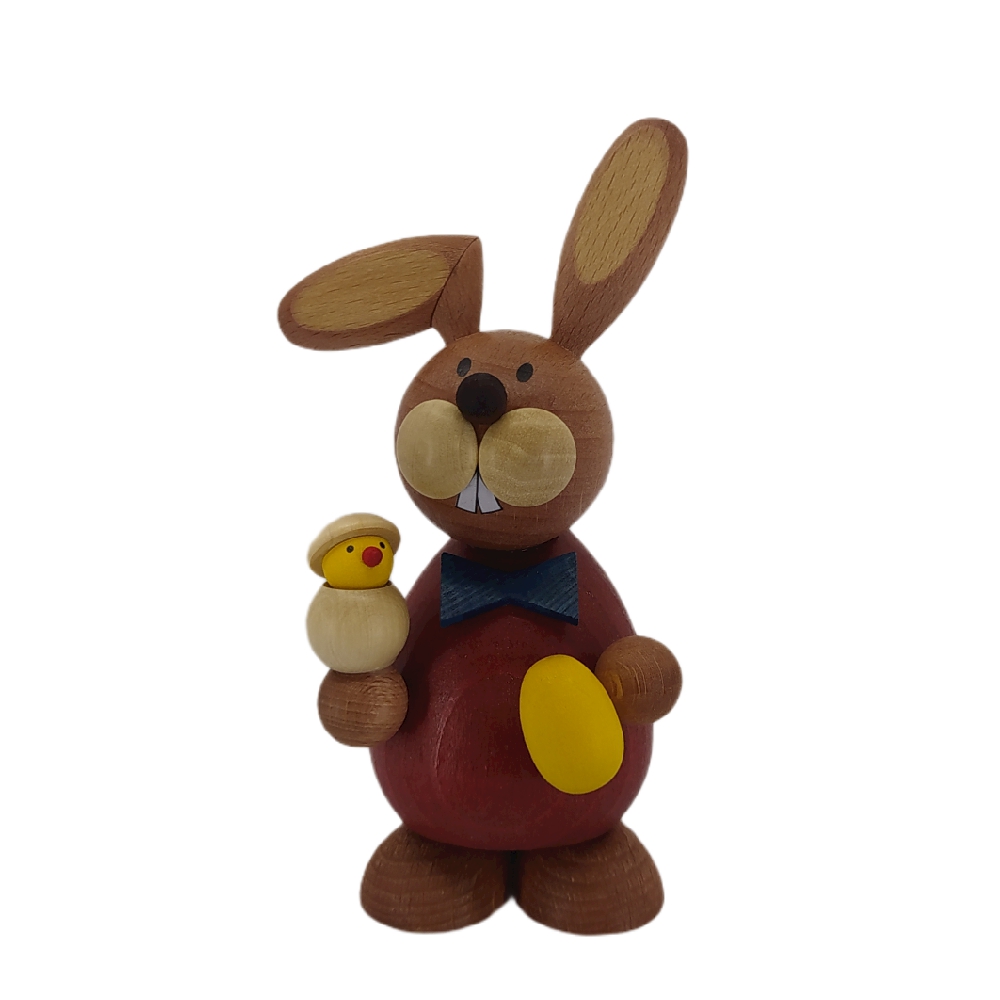Osterhase stehend mit schlüpfenden Küken