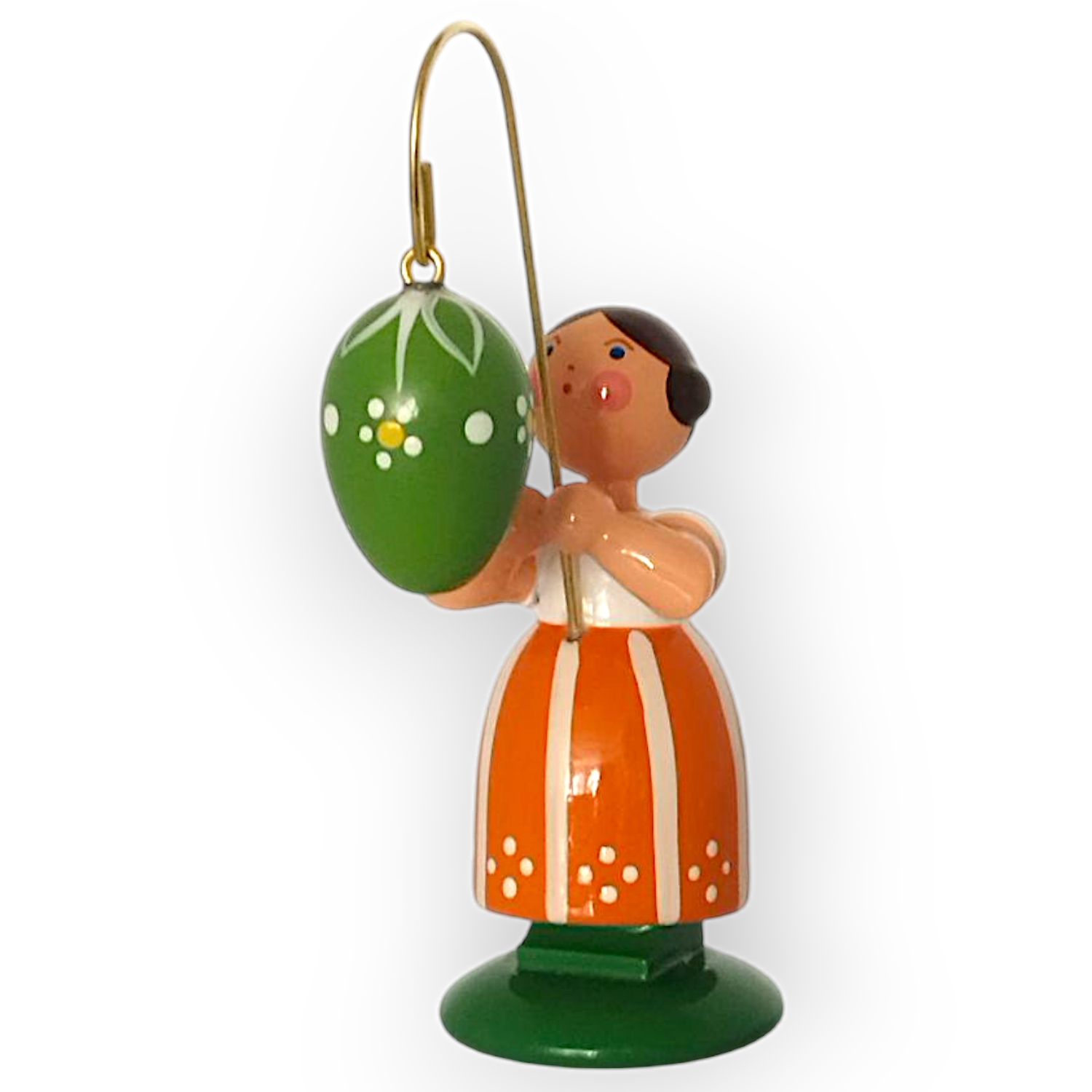Ostermädchen mit grünem Ei