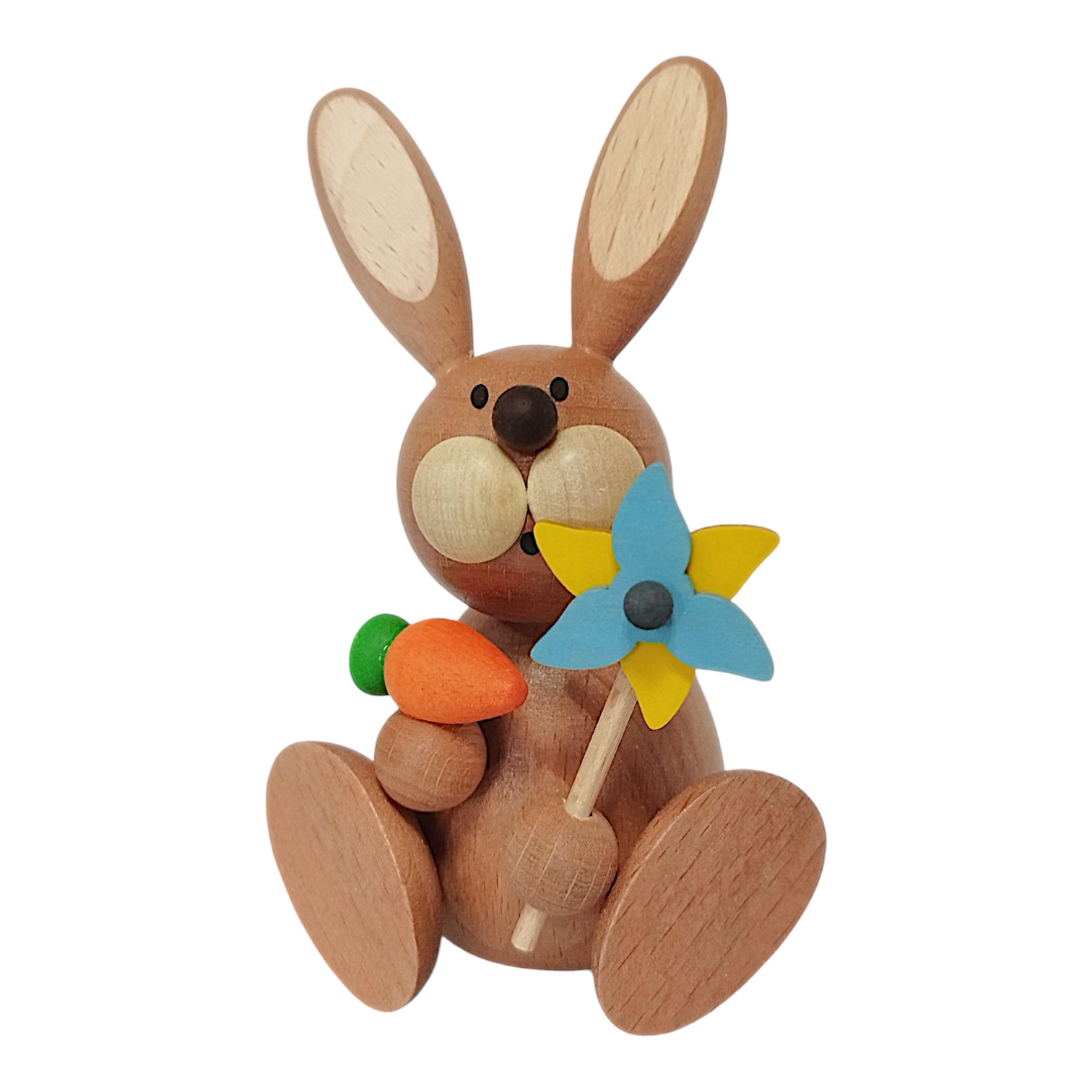 Osterhase sitzend mit Windrad