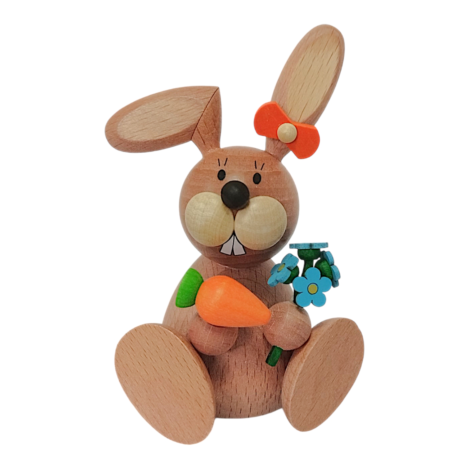 Osterhäsin sitzend mit Möhre und Vergissmeinnicht