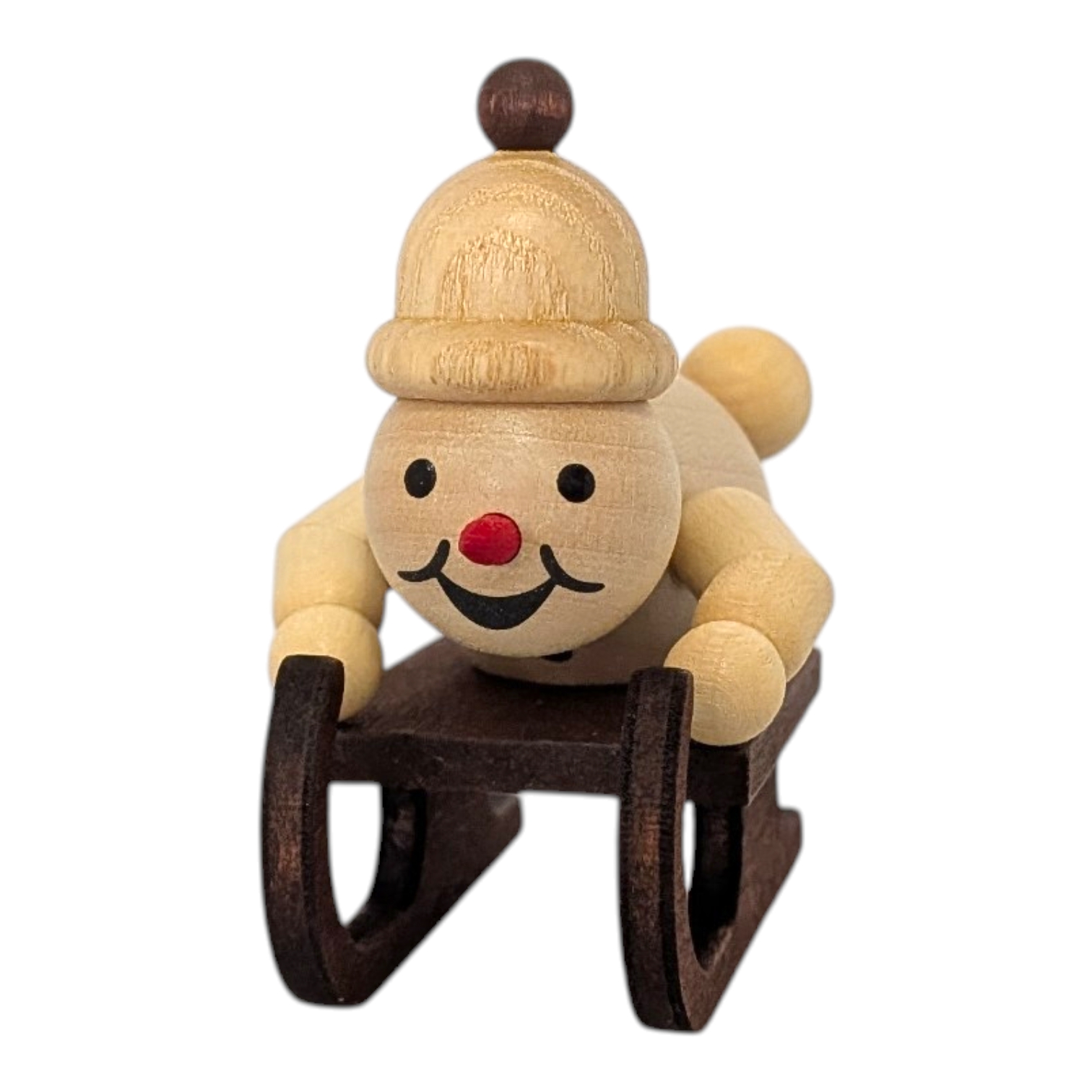 Schneemann Junior ohne Sockel auf Rennschlitten