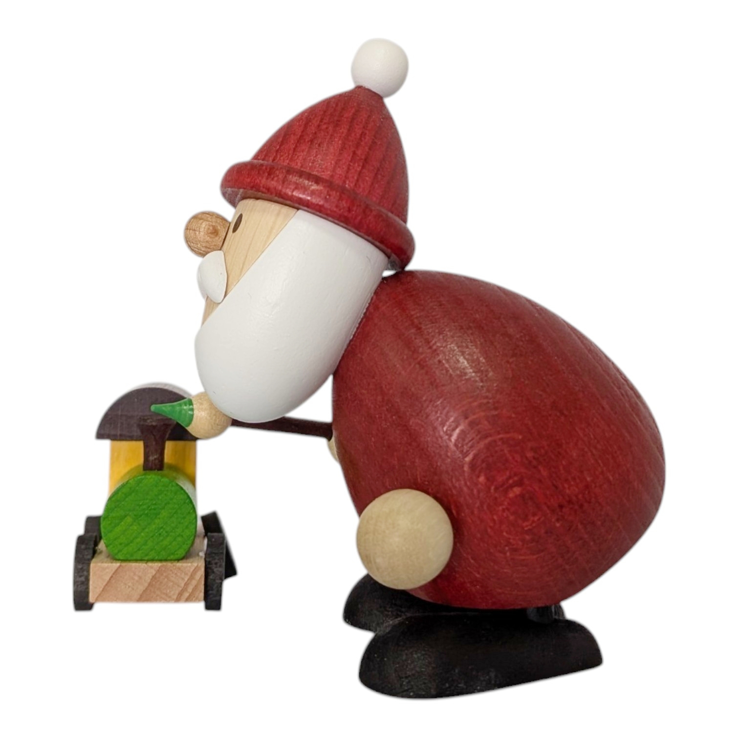 Weihnachtsmann mit Pinsel und Eisenbahn