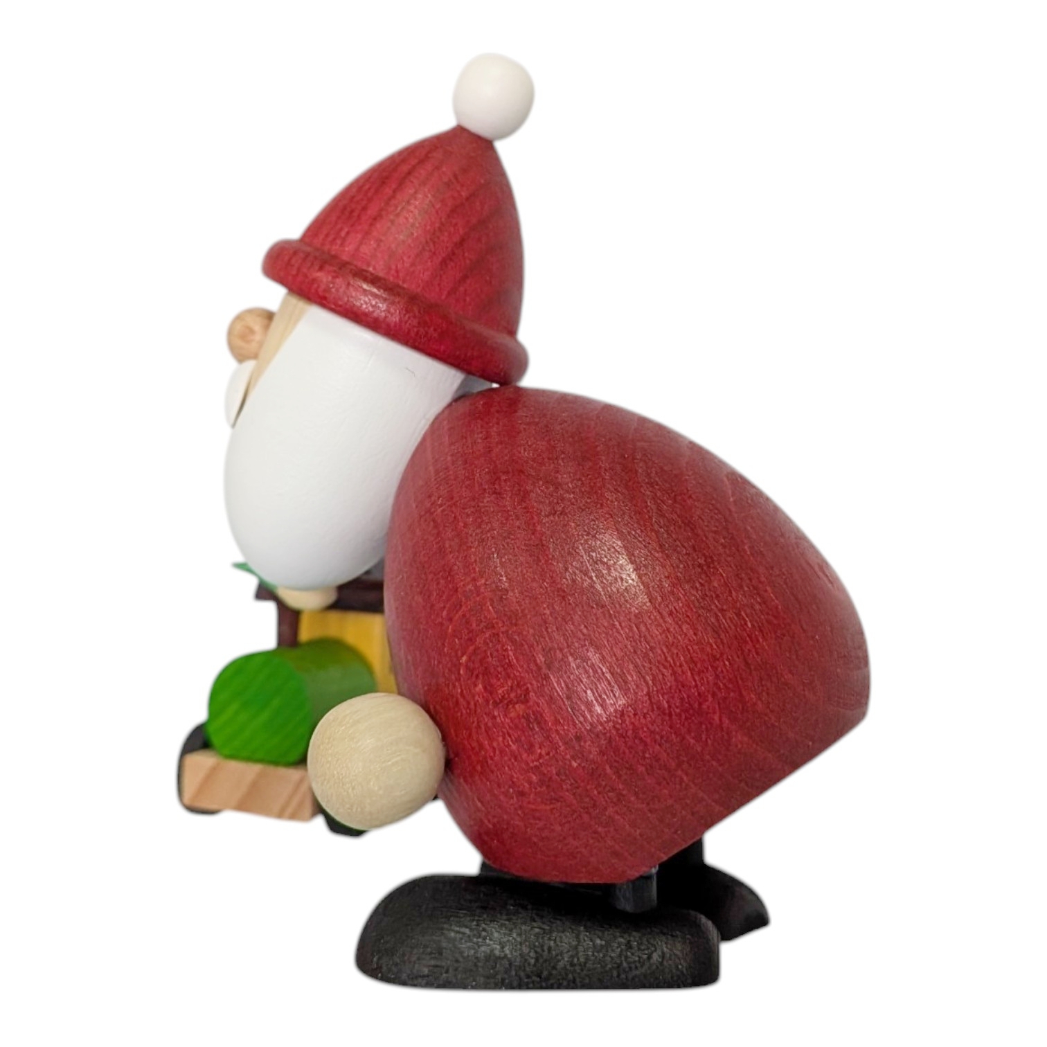 Weihnachtsmann mit Pinsel und Eisenbahn