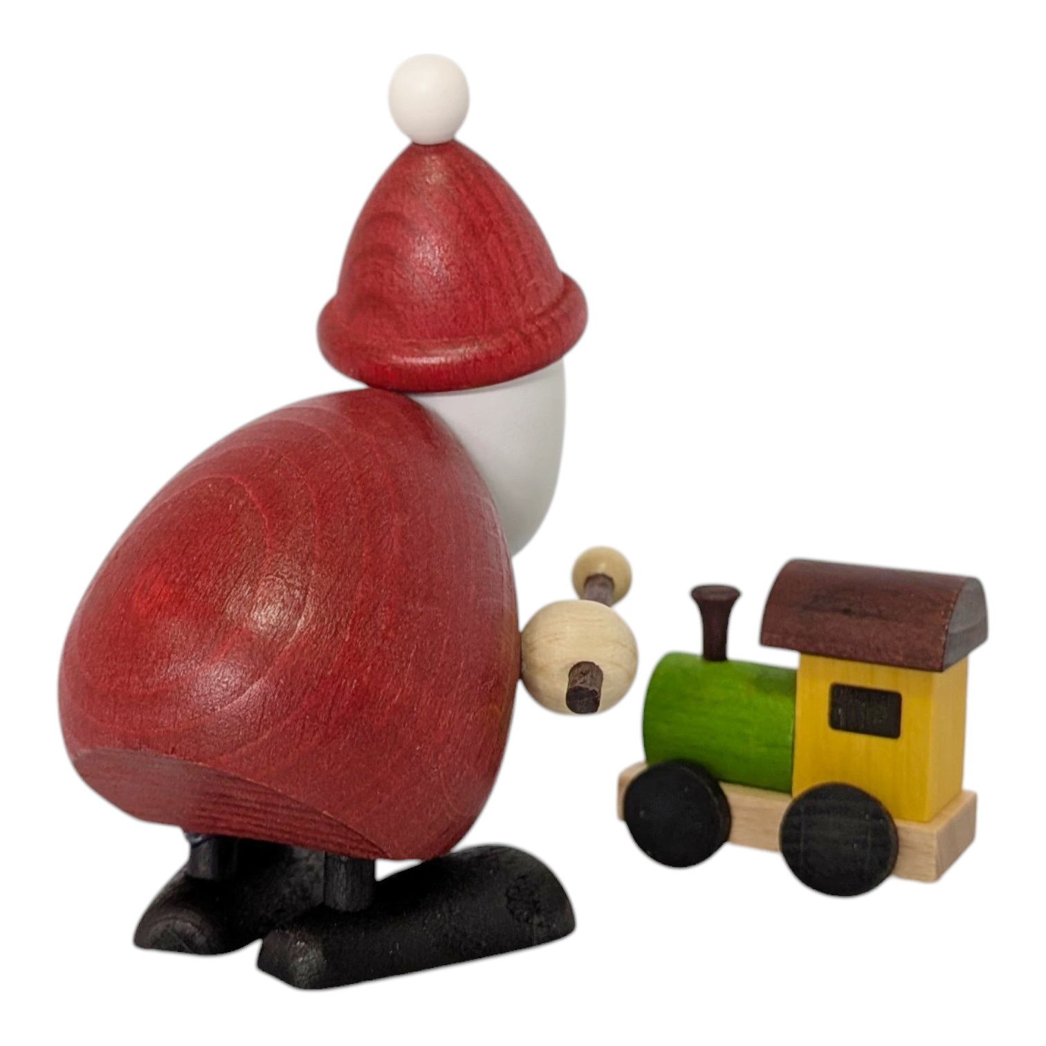 Weihnachtsmann mit Pinsel und Eisenbahn