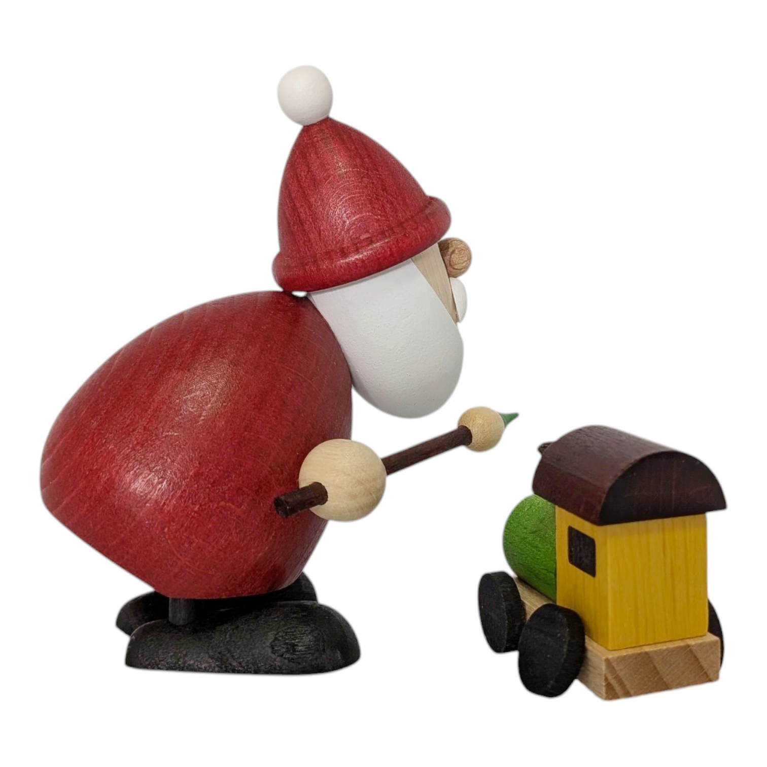 Weihnachtsmann mit Pinsel und Eisenbahn