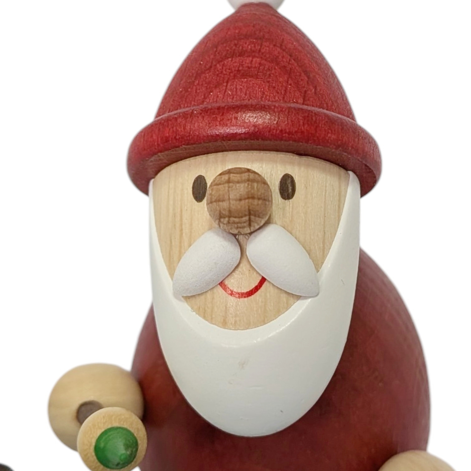 Weihnachtsmann mit Pinsel und Eisenbahn