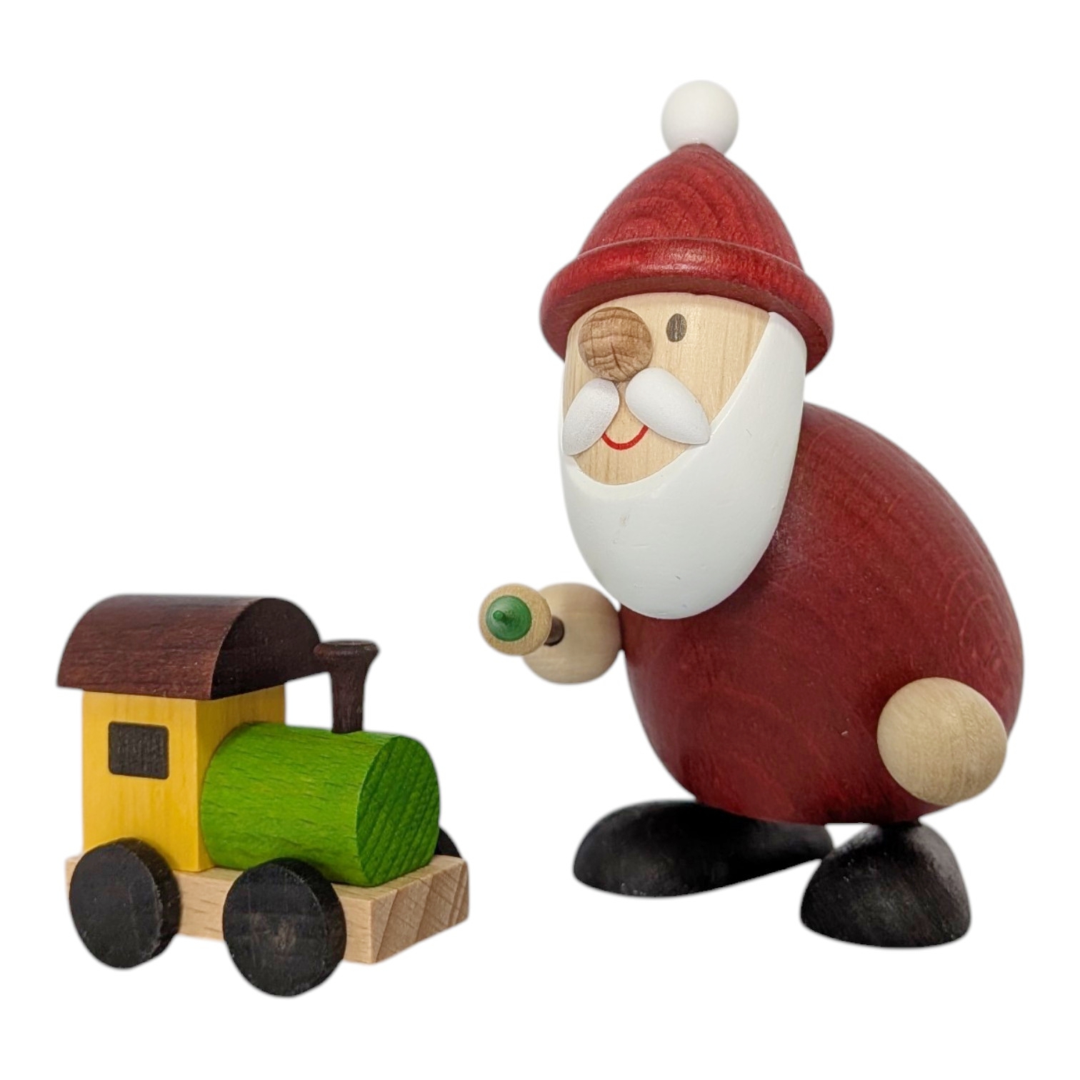 Weihnachtsmann mit Pinsel und Eisenbahn