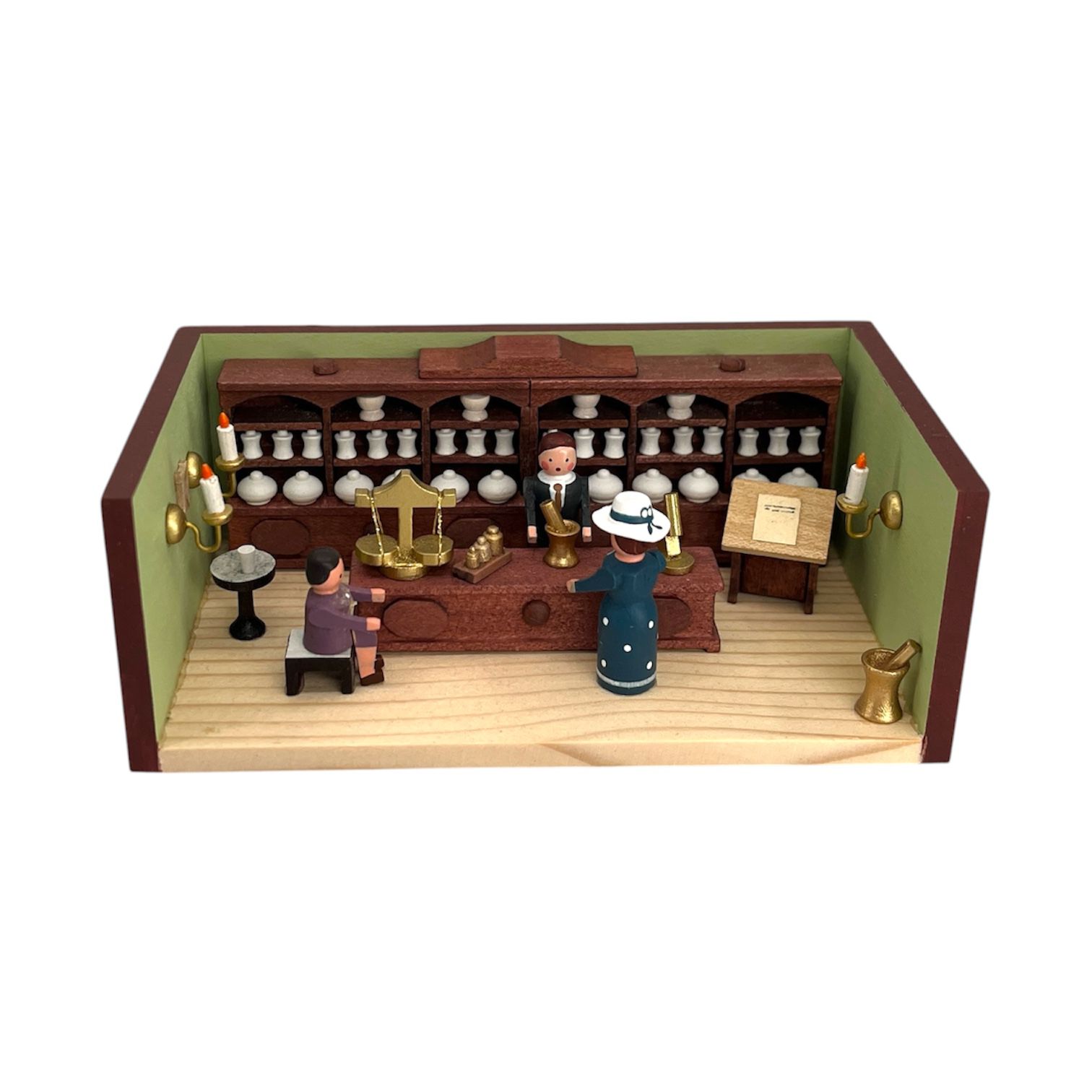 Miniaturstube Apotheke mit Verkäufer